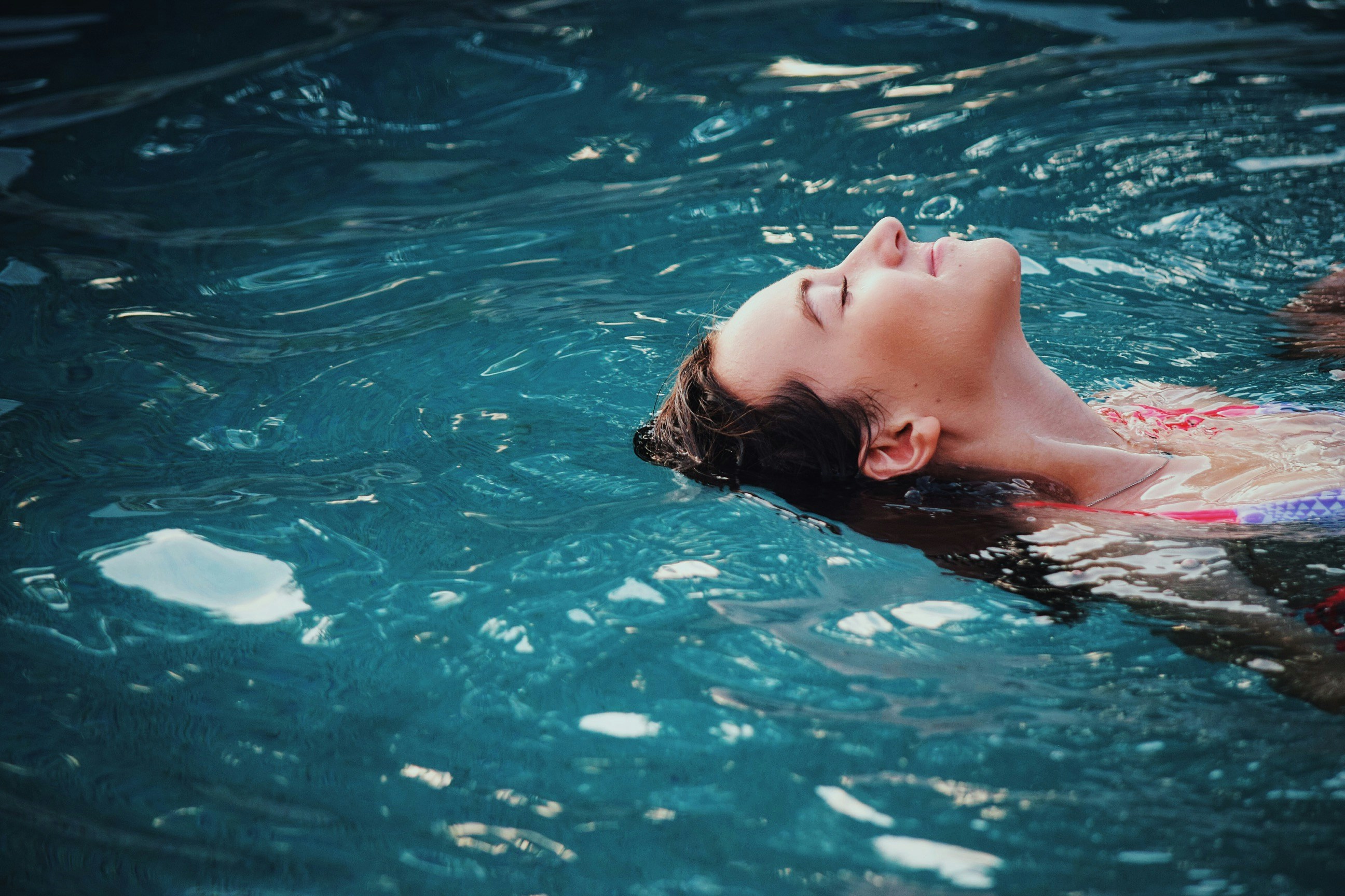 Woman Swimming - Unsplash Image